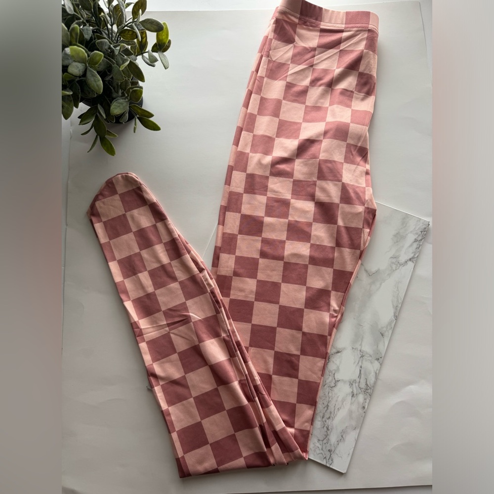 Do My Self  checkered tights /leggings with  two tones of pink . Size M  and NWT